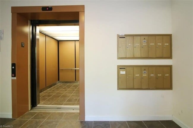 Building Photo - Inviting, modern two bedroom with garage parking, balcony views and a wonderful location in Chape...