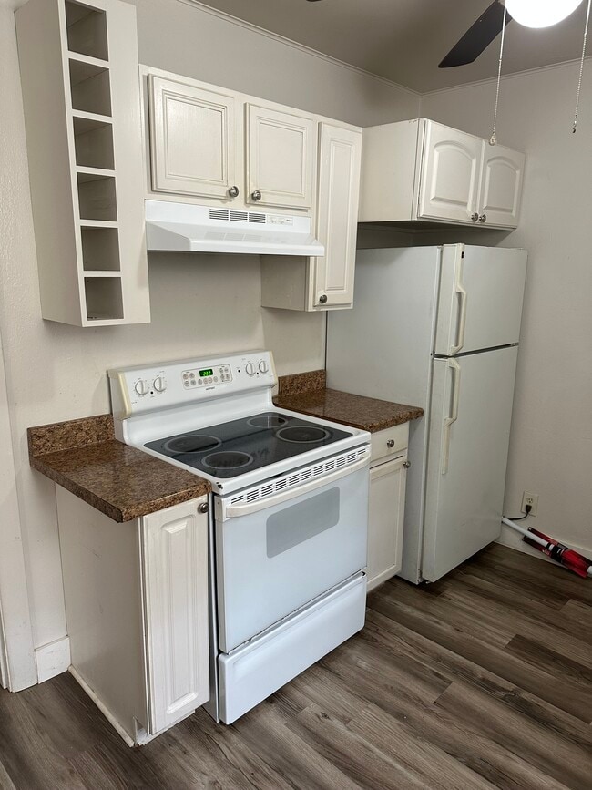 Kitchen features flat-top electric range for easy cleaning! - 575 N Kansas St