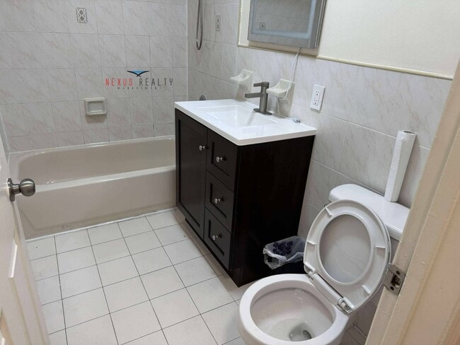 Building Photo - 34-39-39 69th St