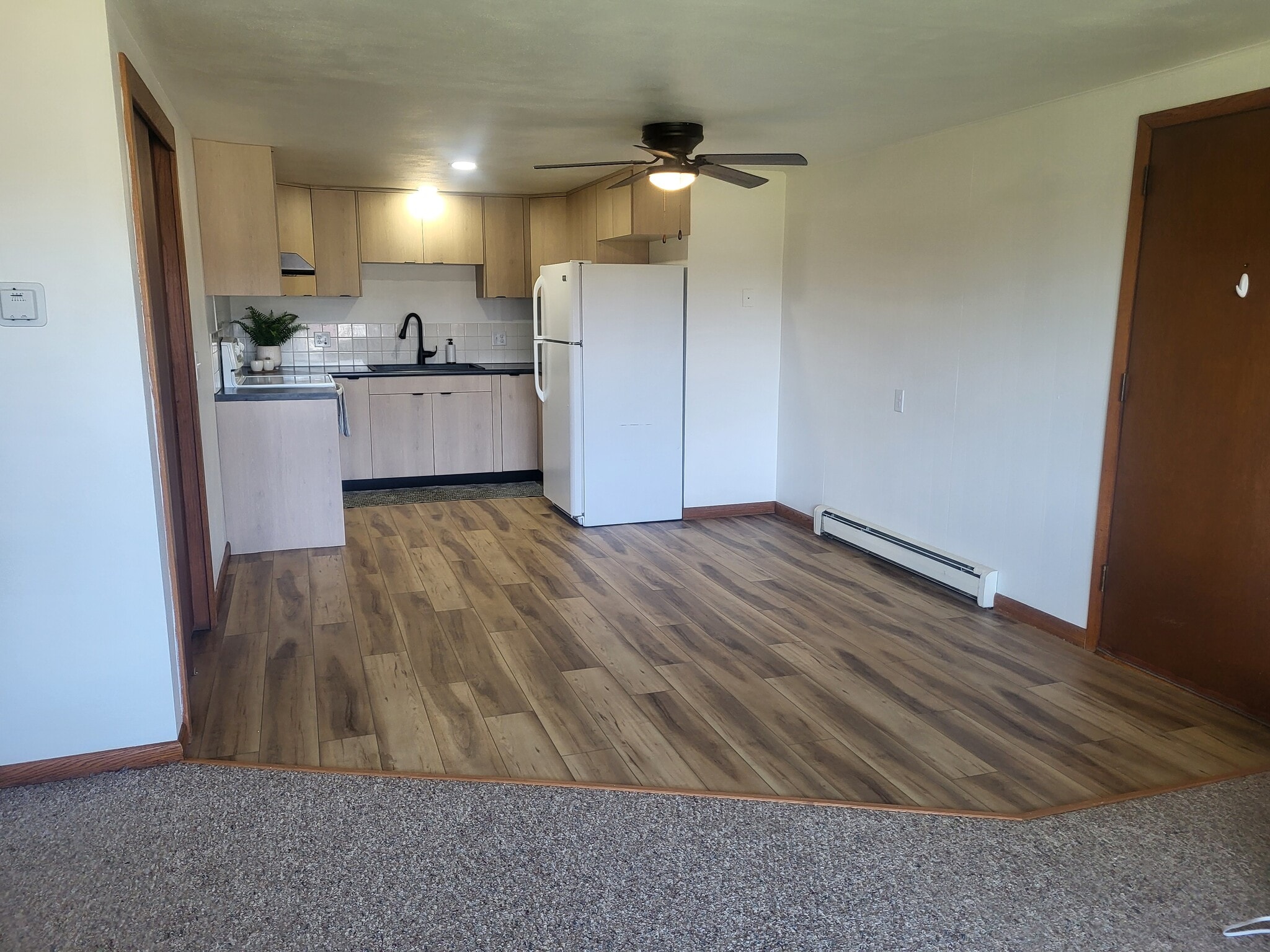 New flooring in kitchen and dining area, 12' x 16' - 941 Buena Vista Dr