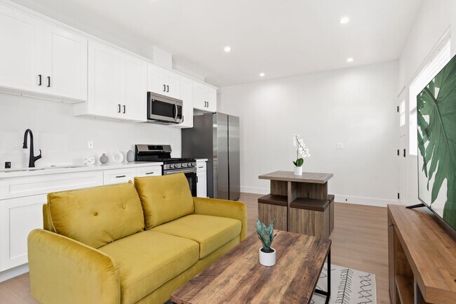 Building Photo - A 3 Bedroom apartment with ensuite bathrooms, common areas and a fully functional kitchen at 1736...