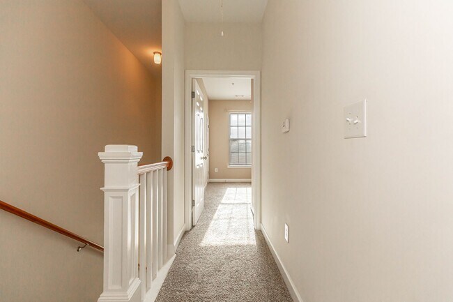 Building Photo - Located just Steps from Shopping, Dining, ...