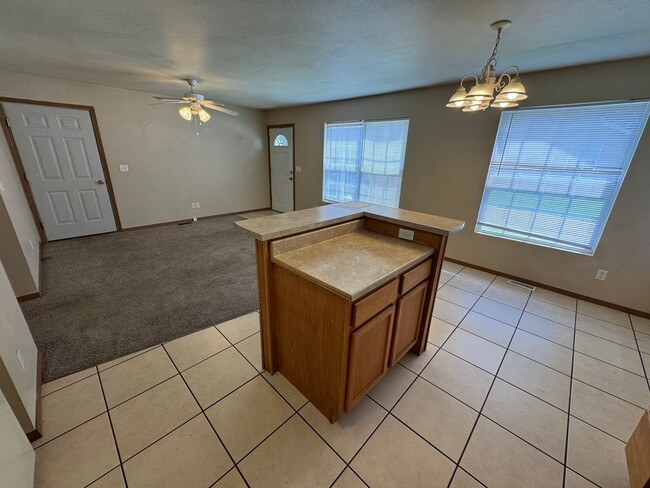 Building Photo - 2 bedroom 2 bathroom duplex with yard care...