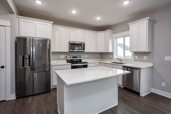 Building Photo - Like-New 4-Bedroom Home in Heritage Park –...