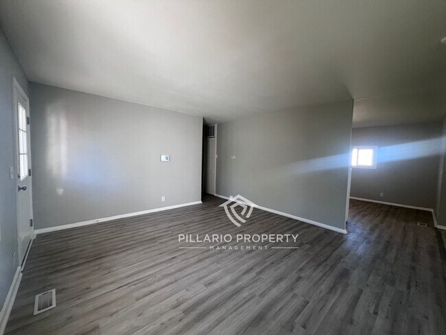 Building Photo - 4-Bedroom Home with Spacious Kitchen & Detached Garage, Available NOW!