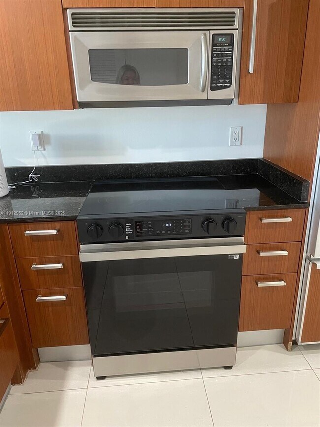 Building Photo - 10275 Collins Ave