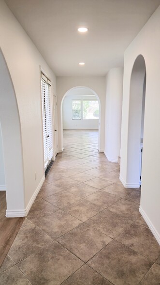Hallway to Bedroom 1, Kitchen, & Family Room - 4317 Palazzo Ln