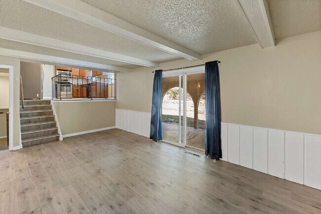 Building Photo - 3-Bedroom with A Flex Room Multi-Level Home with Fresh Paint, Refreshed Deck, and Multiple Living...