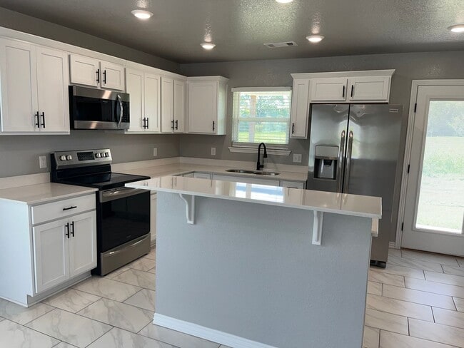 Building Photo - COX-NORTHRIDGE DRIVE TOWNHOMES