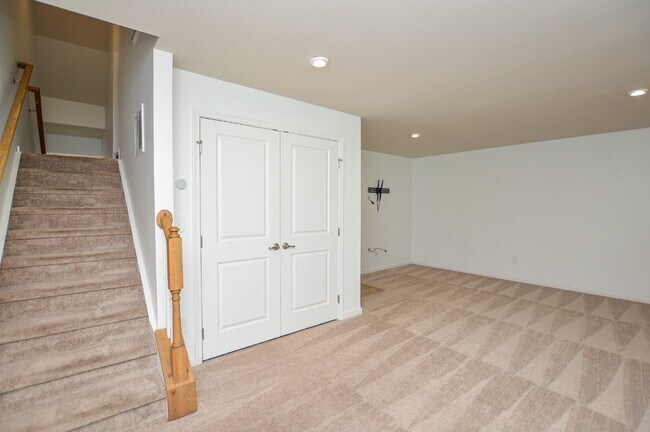Building Photo - 3 Bedrooms | 2.5 Bathrooms | Lower-Level Flex Room | Approximately 1,978 Square Feet | 2-Car Gara...