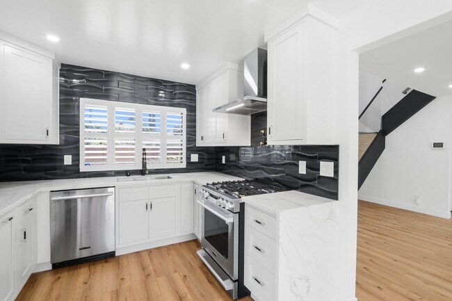 Building Photo - Renovated Lake Forest Home with Expansive Yard & Modern Finishes