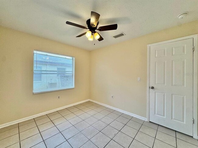 Building Photo - 10015 N Aster Ave