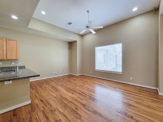 Building Photo - Elegant Gated Townhome Offering Unparallel...