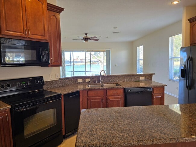 Building Photo - Lakefront Single Family Home with Views of Outdoor Paradise