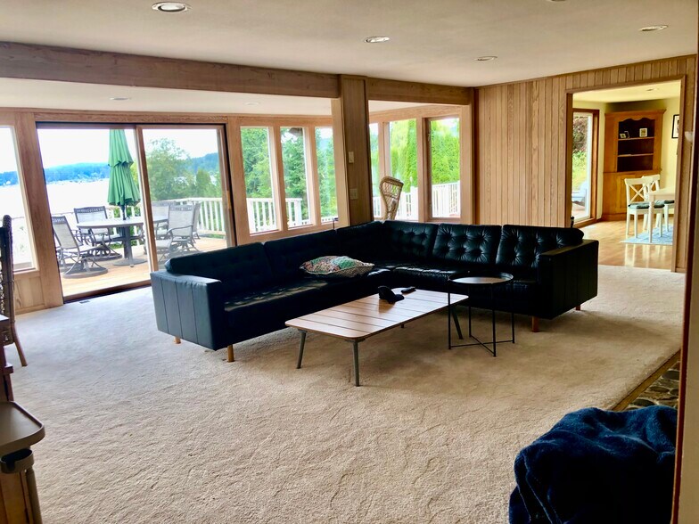 Living room with wonderful views & access to decks - 7107 120th St NW