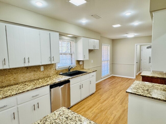 Building Photo - Updated 4-Bedroom Ranch with the layout everyone wants