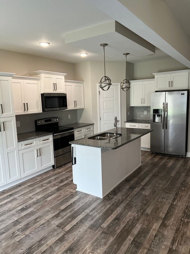 Building Photo - Spacious 4 Bedroom Home in Sango