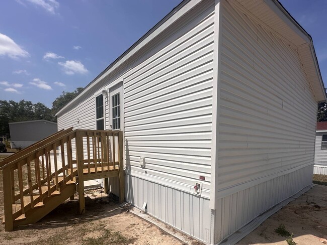 Building Photo - 7865 W Hwy 40