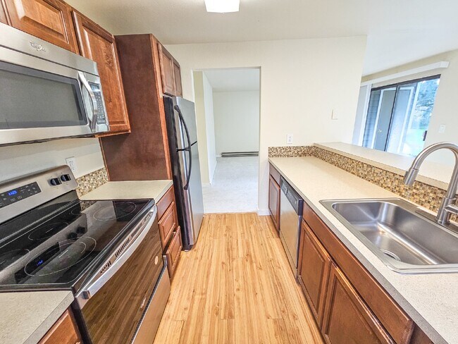 Building Photo - Coming Soon.  Ground level condo near Microsoft Campus! New Paint, New Carpet, and updates throug...