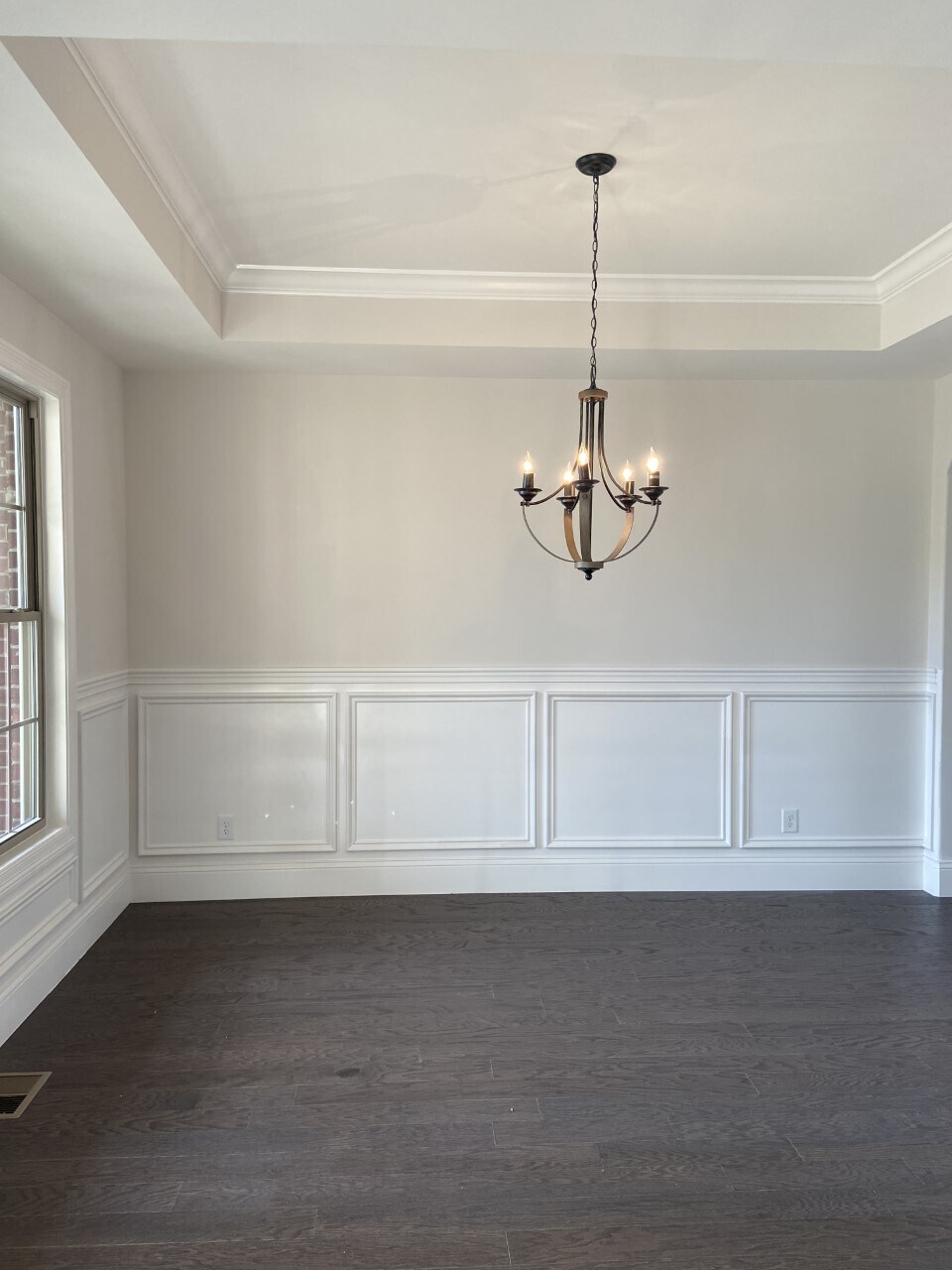 dining room with wainscotting - 1026 October Park Way