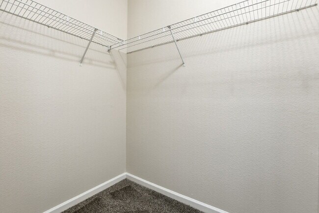 Building Photo - $1,840.95, 2-bed, 2-bath condo in a gated community with a washer/dryer.