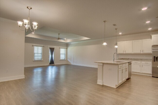 Building Photo - Spacious Cantonment Townhome with Open Layout, 2-Car Garage, Covered Back Porch & Easy Access to ...