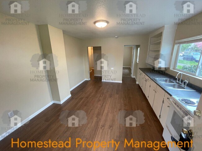 Building Photo - 219-219 1/2 S Monmouth Ave