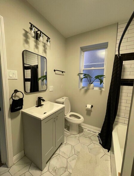 Building Photo - 1954 E 73rd Pl