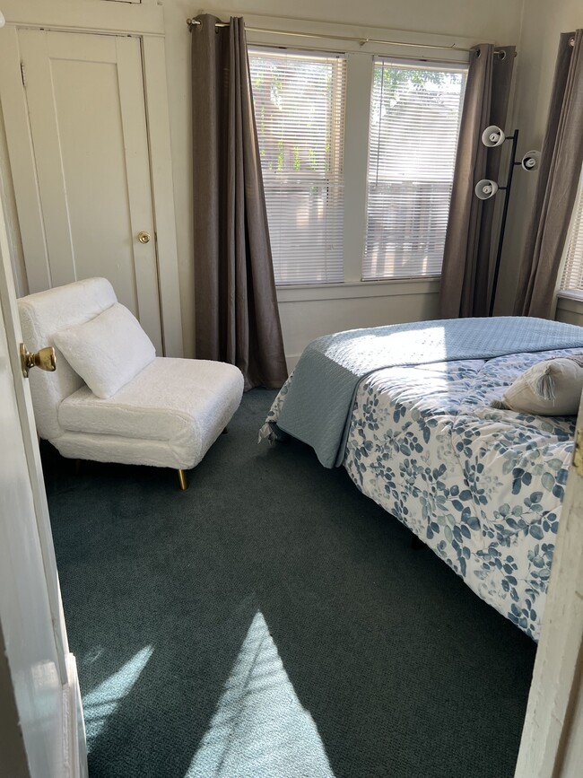 Comfortable queen bed with twin bed that’s a chair and bed ! - 1440 3rd Ave