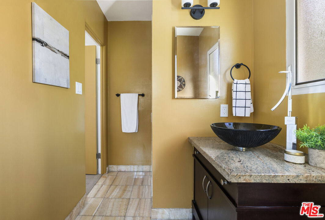 Bathroom shared by second and third bedrooms. - 1850 San Jacinto St