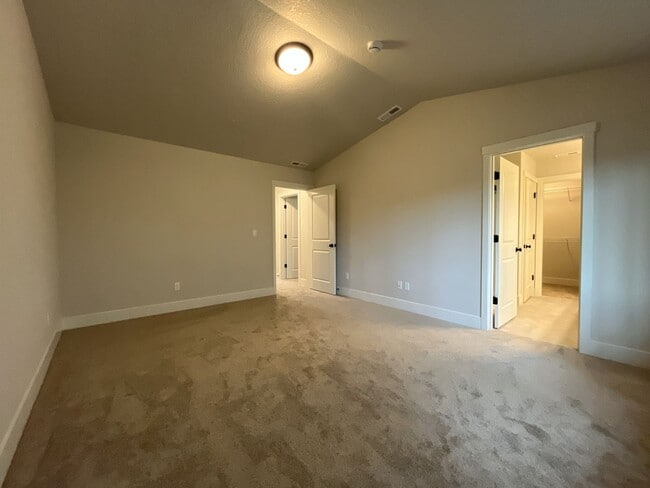 Building Photo - Modern 2025-Built 4 Bedroom Home with EV Charging, 5kW Solar, Open-Concept Living, Scenic Outdoor...