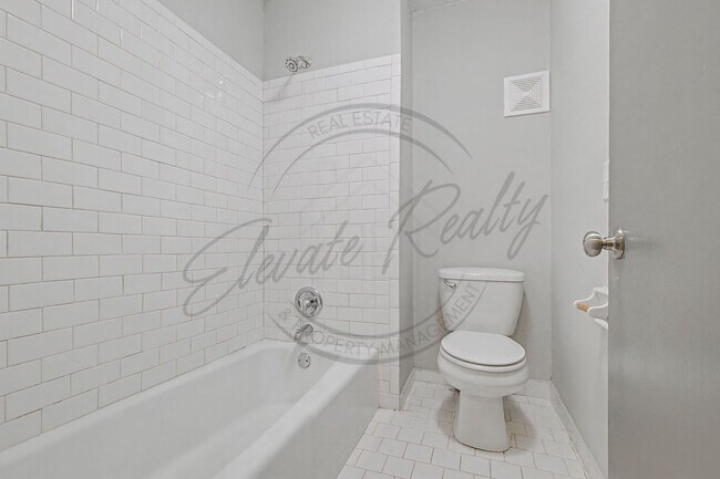 Building Photo - Two Bedroom Condo, First Floor, across from Madison Park with stackable washer/dryer!