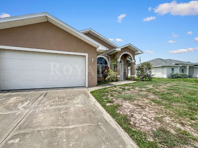 Building Photo - 3BR/2BA Cape Coral Home You'll Compare Every Other Rental To