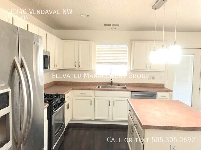 Building Photo - 10340 Vendaval Ave NW