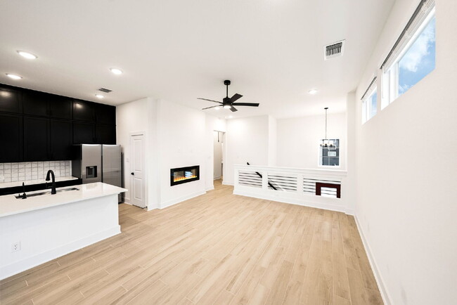 Building Photo - Brand-New, Never-Lived-In Townhome – A San...