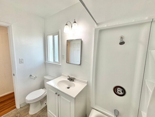 Building Photo - An apartment with character! Hardwood floo...