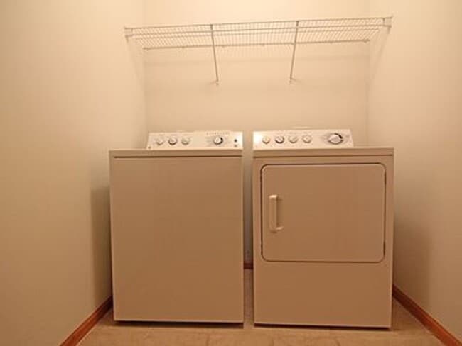 Building Photo - Great NE location -  4 bedroom 2.5 bath with attached 2 stall garage. Close to shopping & restaur...