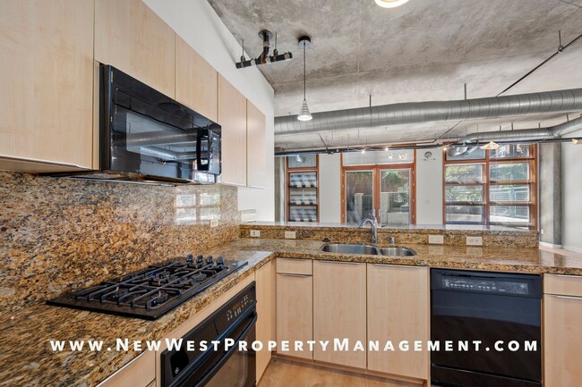Building Photo - Expansive East Village loft at Parkloft, a...