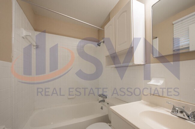 Building Photo - Charming Brick Ranch on a Spacious, Wooded Lot!