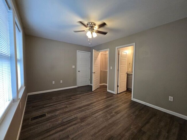 Building Photo - Live Steps from the Highland Strip — Share...