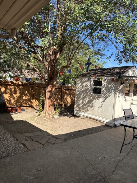 Patio with outdoor storage . The shed has ac and is insulated. It can be used as a home office. - 4804 Forest Ct