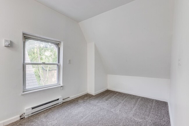 Building Photo - AVAILABLE June 2026 - Beautiful 4 Bedroom, 2 Bath Home w/ Front Porch Swing!