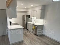 Building Photo - 7080 W 20th Ave