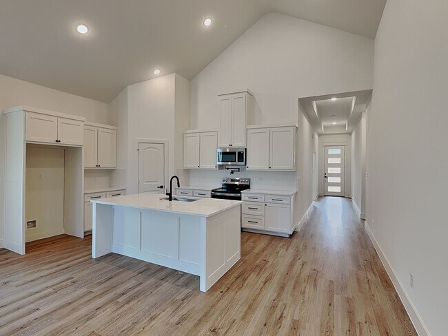 Building Photo - Brand New Modern Luxury with Soaring Ceilings & Designer Finishes!