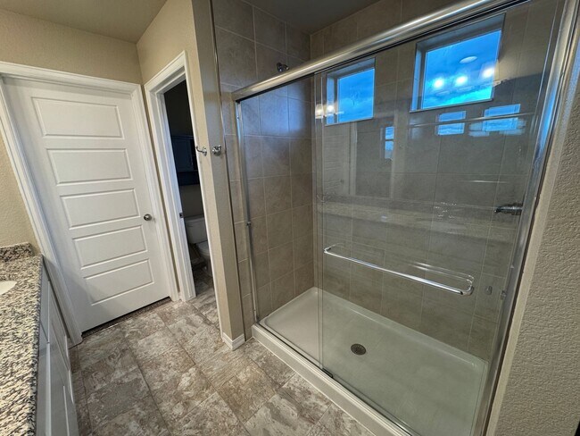 Building Photo - Modern 3-Story Corner Lot Home with Hot Tu...
