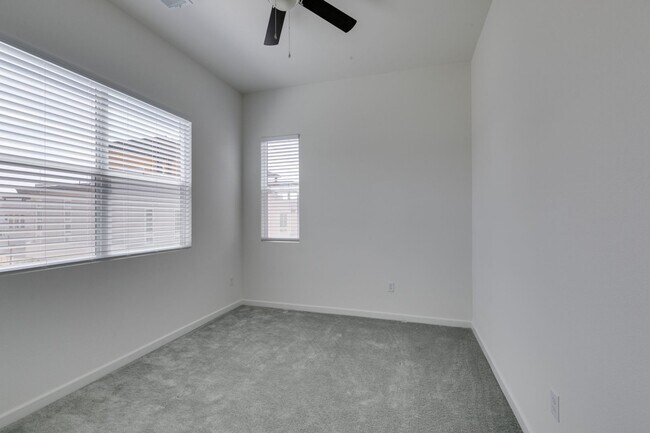 Building Photo - Stunning 4-Level Townhome in Inspirada | R...