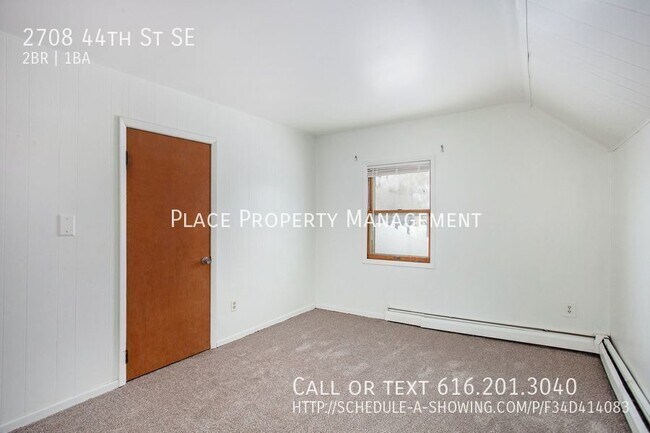 Building Photo - 2708 44th St Se - 2 Bed/1 Bath Upper Apart...