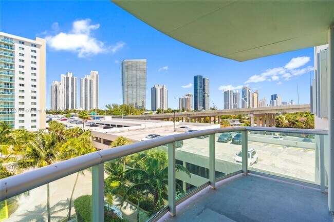 Building Photo - 19390 Collins Ave