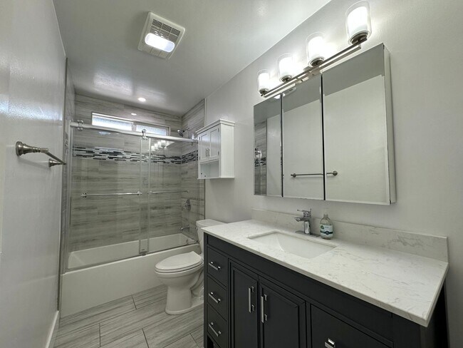 Building Photo - 4875-4885 Normandie Place