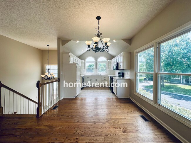 Building Photo - Brand New Paint, Wood Floors, Walkout Fini...